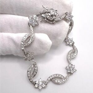 .925 Sterling Silver Clear Cz Flower And Crisscross Design Bracelet